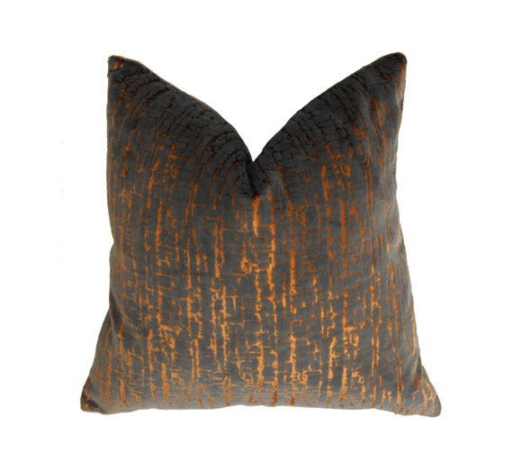 copper and grey cushion