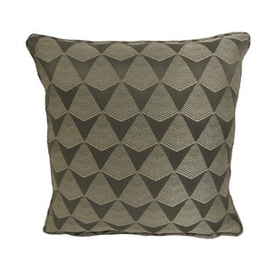 May include: A square throw pillow with a geometric pattern of beige triangles on a dark gray background.