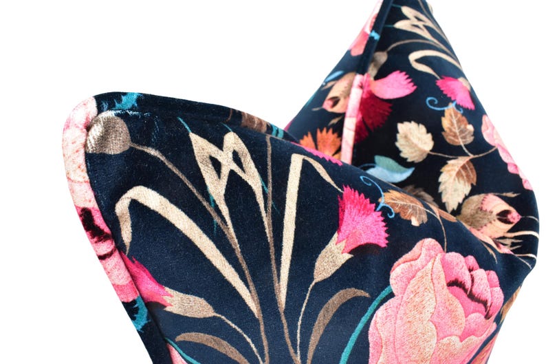 a close up of a tie with flowers on it