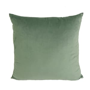 May include: A soft, green velvet pillow with a square shape.