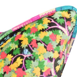 a close up of a colorful object with a white background