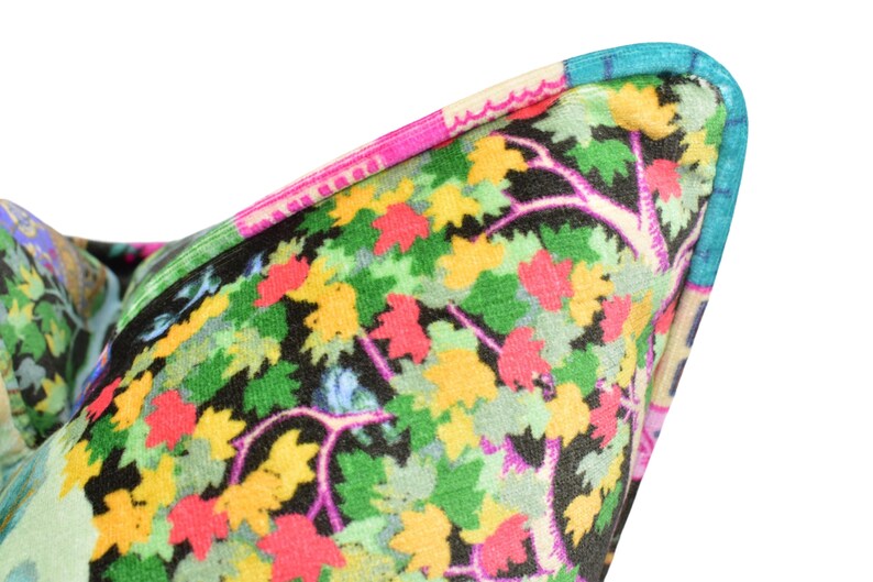 a close up of a colorful object with a white background
