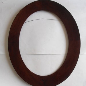 antique big wooden oval frame