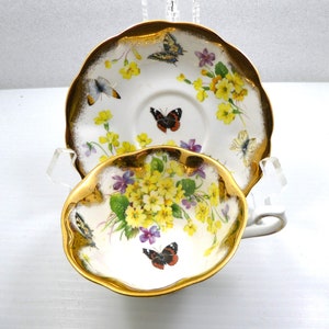 Royal Albert Butterfly Cup and Saucer Decorated with Butterflies and Flowers Heavy Gold Trim Made in England