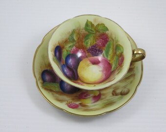 Gold Fruit Decorated Tea Cup and Saucer   Occupied  Japan  Vintage  Hand Painted  With  Gold Overlay   Made in  Japan