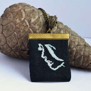 Embroidered Linen Pendant: Black Fabric Necklace with Woman Silhouette