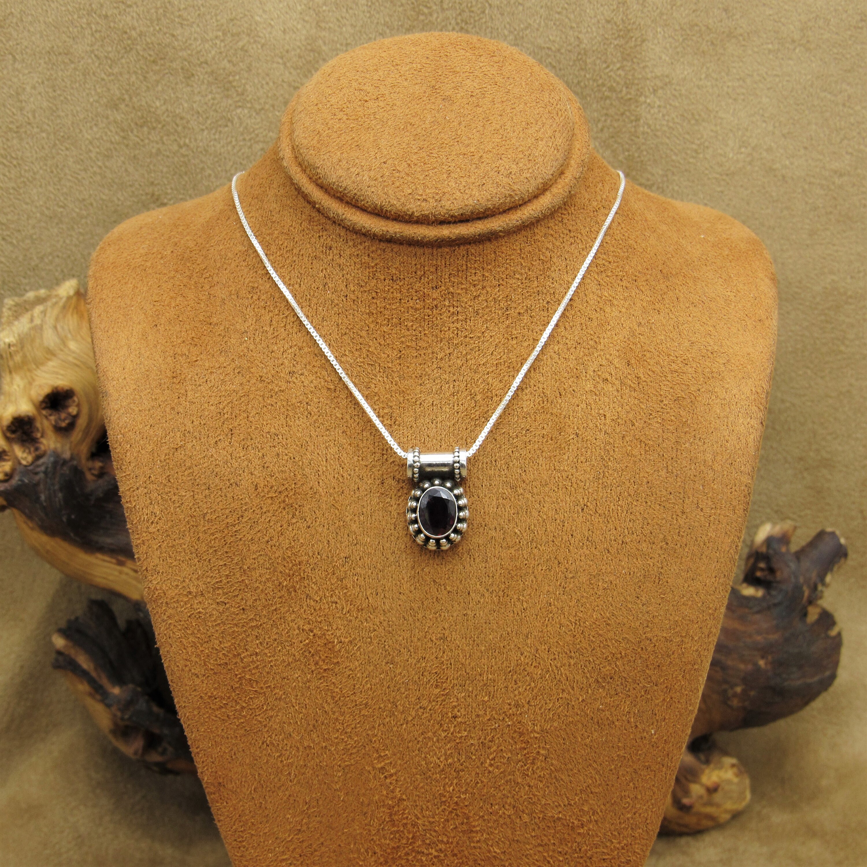 Vintage Sterling Silver Bali Style Pendant with Faceted Garnet