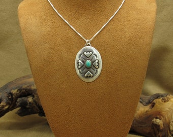 Oval Sterling Silver and Turquoise Repousse Pendant Necklace