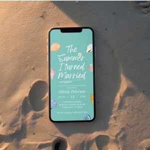 May include: A smartphone screen displaying a bridal shower invitation with a beach theme. The invitation reads "The Summer I Turned Married" and includes details about the event, including the date, time, location, and RSVP information.