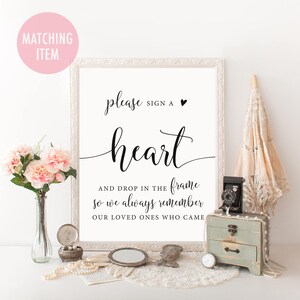 Puede incluir: Un cartel blanco con texto negro que dice "please sign a heart and drop in the frame so we always remember our loved ones who came".