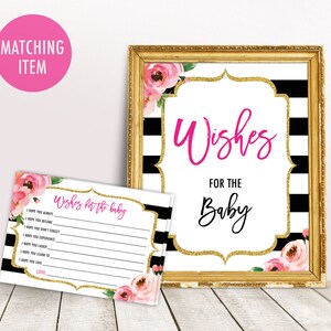 May include: A black and white striped card with gold glitter accents and pink floral accents. The card says "Wishes for the Baby" in black text. There is a matching card with a list of wishes for the baby.