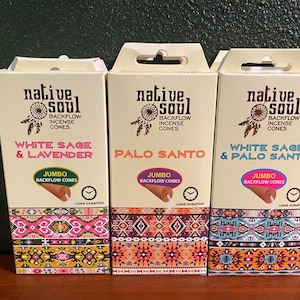 May include: Three boxes of jumbo backflow incense cones. The boxes are white with a colorful pattern and feature the text "native soul" and the scents "White Sage & Lavender", "Palo Santo", and "White Sage & Palo Santo".