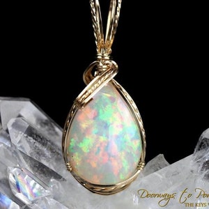Mystical Opal Meditative Light Crystal Pendant 14k