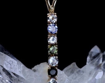 Colgante Synergy 7 Piedras Azeztulita, Tanzanita, Danburita, Moldavita, Herderita, Tektita Tibetana, Fenacita 14k