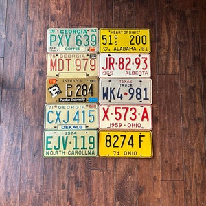 License plate choice vintage worn out,all authentic license plates, Texas Ohio Alabama  Georgia Alberta,crafting license plates.