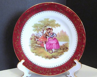 Piatto vintage Limoges Fragonard: coppia di corteggiatori francesi in porcellana, bordeaux e oro