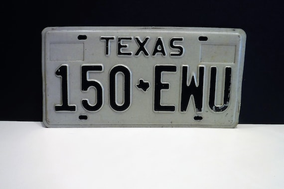 Texas License Plate: 150 EWU, Black Letters, Lone Star State Decor