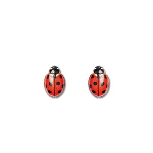 May include: A pair of ladybug stud earrings. Each earring features a red body with black spots and a black head. The earrings are set against a white background.