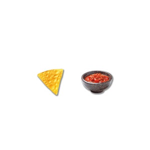 May include: A single, golden-yellow tortilla chip next to a small, dark speckled bowl filled with red salsa. The chip is triangular with a textured surface, and the salsa appears chunky.