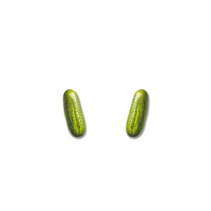 May include: Two fresh, green cucumbers with textured skin are displayed against a white background. The cucumbers are oblong in shape and have a slightly curved appearance. The image is well-lit, highlighting the natural colors and details of the vegetables.