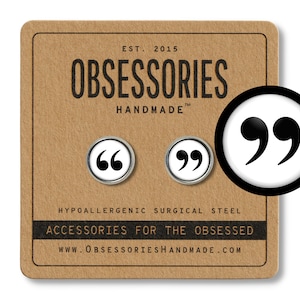 May include: A pair of silver earrings with black quotation marks on a white background. The earrings are hypoallergenic and made of surgical steel. The text on the card reads "EST. 2015 OBSESSORIES HANDMADE TM HYPOALLERGENIC SURGICAL STEEL ACCESSORIES FOR THE OBSESSED WWW.OBSESSORIESHANDMADE.COM"