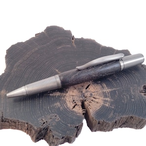 Irish bog oak engraved wood pens.