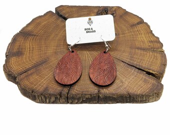 Padauk wood teardrop earrings with design engraved.