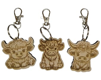 Llaveros de madera con forma de vaca de las Tierras Altas