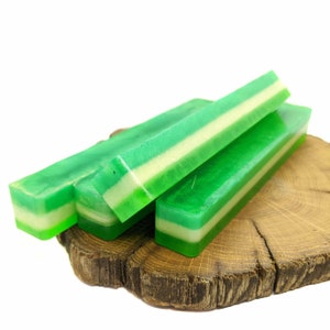 Striped green and pearlescent acrylic pen blanks.