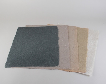 Assortment of various handmade paper sheets, linen paper ephemeral, excess pieces of handmade paper for bookbinding, card making