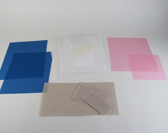 Colored transparent paper scraps, pieces of blue-pink translucent paper for: DIY, bookbinding, scrapbooking, paper for creation