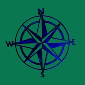 May include: A blue metal compass with a star-shaped design and the letters N, S, E, and W.
