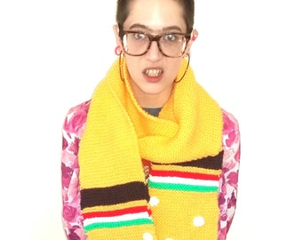 Burger scarf. Hand knitted yellow scarf with polka dot detail