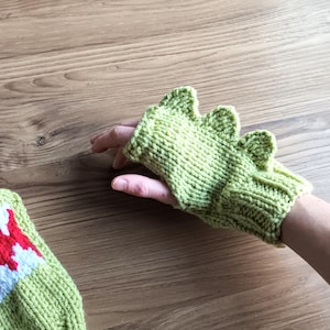 Dinosaur mittens. Hand knitted green dino mittens/fingerless gloves with mouth detail