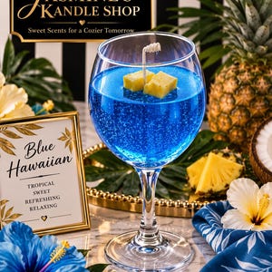 May include: A Blue Hawaiian candle in a clear stemmed glass with a white wick and yellow wax pineapple chunks. A sign reads Jasmine's Kandle Shop, Sweet Scents for a Cozier Tomorrow, and Blue Hawaiian, Tropical, Sweet, Refreshing, Relaxing.