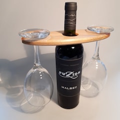 Wine glass holder gift - handmade wooden stand which sits on a bottle of wine.
