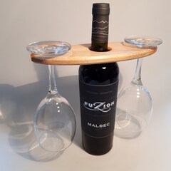 Wine glass holder gift - handmade wooden stand which sits on a bottle of wine.