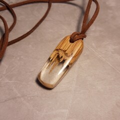 Handmade, secret wood oak and clear resin pendant.