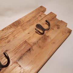 Handmade rustic coat hooks made from repurposed pallet wood.