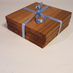 Beautiful handmade oak coasters in a simple, elegant square design. 