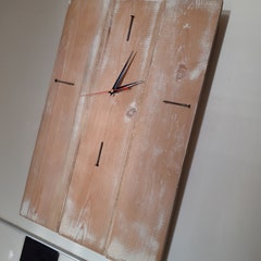 Handmade wall clock from repurposed wood.