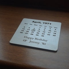 Custom coaster with a special date and year.