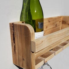 Handmade wall-mounted wine rack for 4 bottles and 4 glasses.