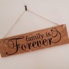 Solid oak sign for a family finished in Danish Oil.