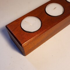 Handmade mahogany tea light holder from reclaimed wood.