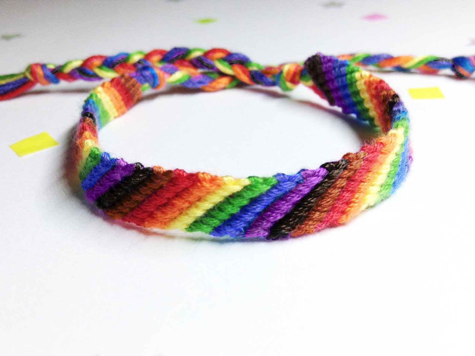 Gay / LGBTQIA bracelet with black and brown stripes | Etsy
