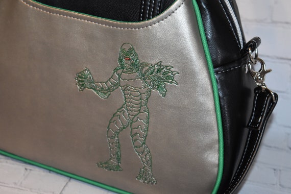 Creature purse cheap