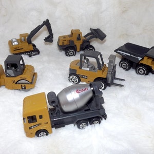 Miniature Construction Vehicles. Miniature Dollhouse Toys. Train Layout Upgrades. Miniature Trucks, Earth-movers. Model Railroad Accessories