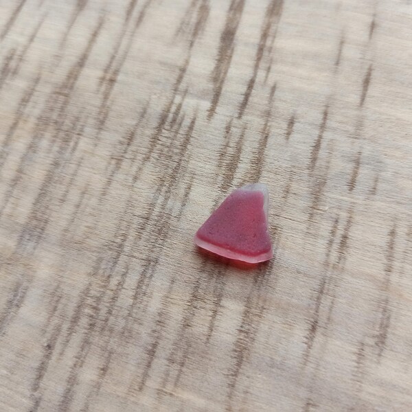 Red tiny sea glass piece