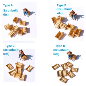 May include: Eight wooden crate kits, each with a different design, are arranged in four groups of two. Each group is labeled with a letter and the text "(8x unbuilt kits)".